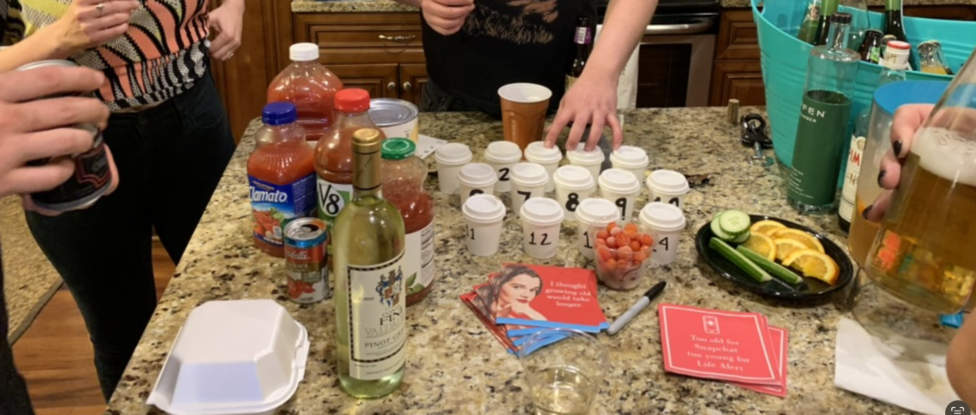 The actual blind tomato juice taste test — 14 numbered cups, multiple brands, and very strong opinions